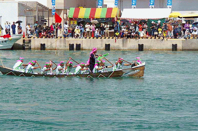 pink and green uniforms, boat team, acing