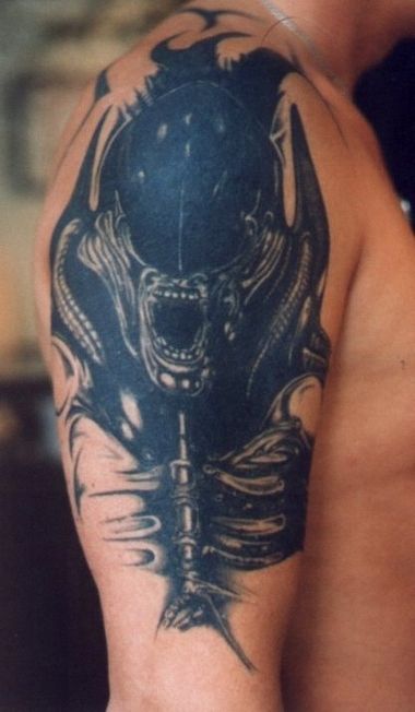 Alien Tattoos Designs 2011 Men loves having alien tattoos imprinted on