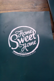 The Home Sweet Home Logo on the menu. Located on Edge Street, Northern Quarter in the center on Manchester.