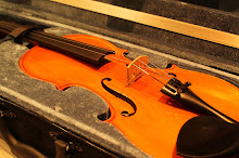 It's my first violin.26.3.2012.a girl love in music.