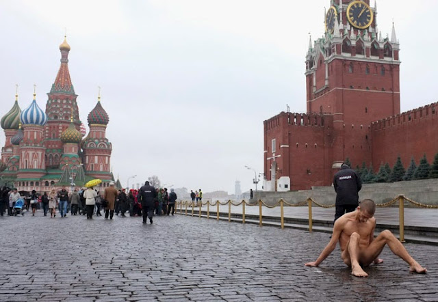 Russian Artist Nails His Genitals To Red Square Cobblestone