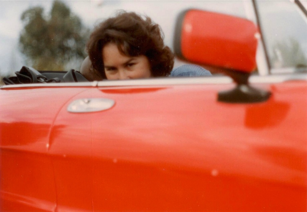 The same lady a few years later is sitting in my Alfa Romeo Spider below