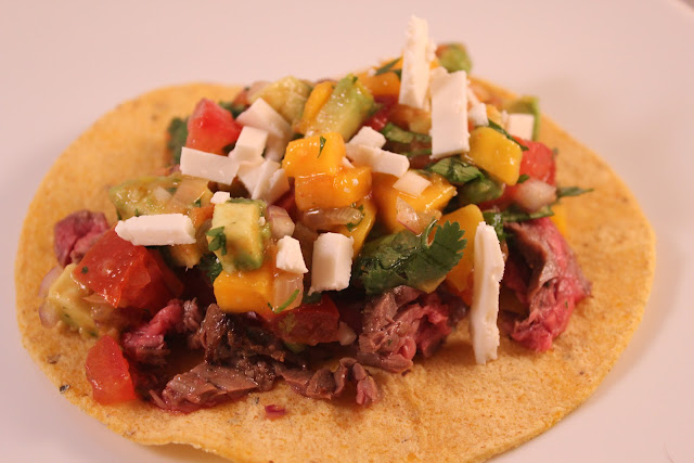 Skirt steak tacos with mango guacamole