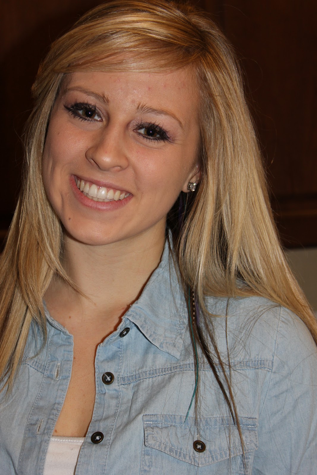 blushing basics How to Apply Feather Hair Extensions