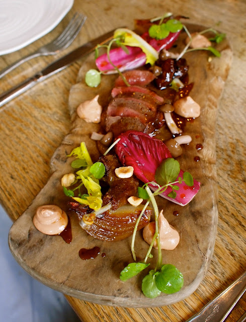 Warm salad of wood pigeon, with creamed livers, bitter leaves and turnips