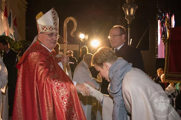 Princess Charlene of Monaco and Prince Albert II of Monaco attend the Sainte-Devote ceremony