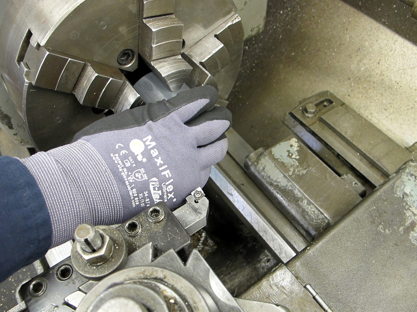 "Nothing Too Strong Ever Broke" Gloves in the machine shop