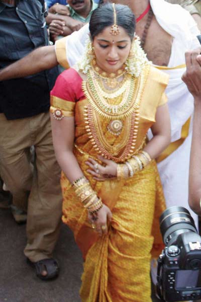 Upskirt Artis Kavya Madhavan Wedding Reception Photos
