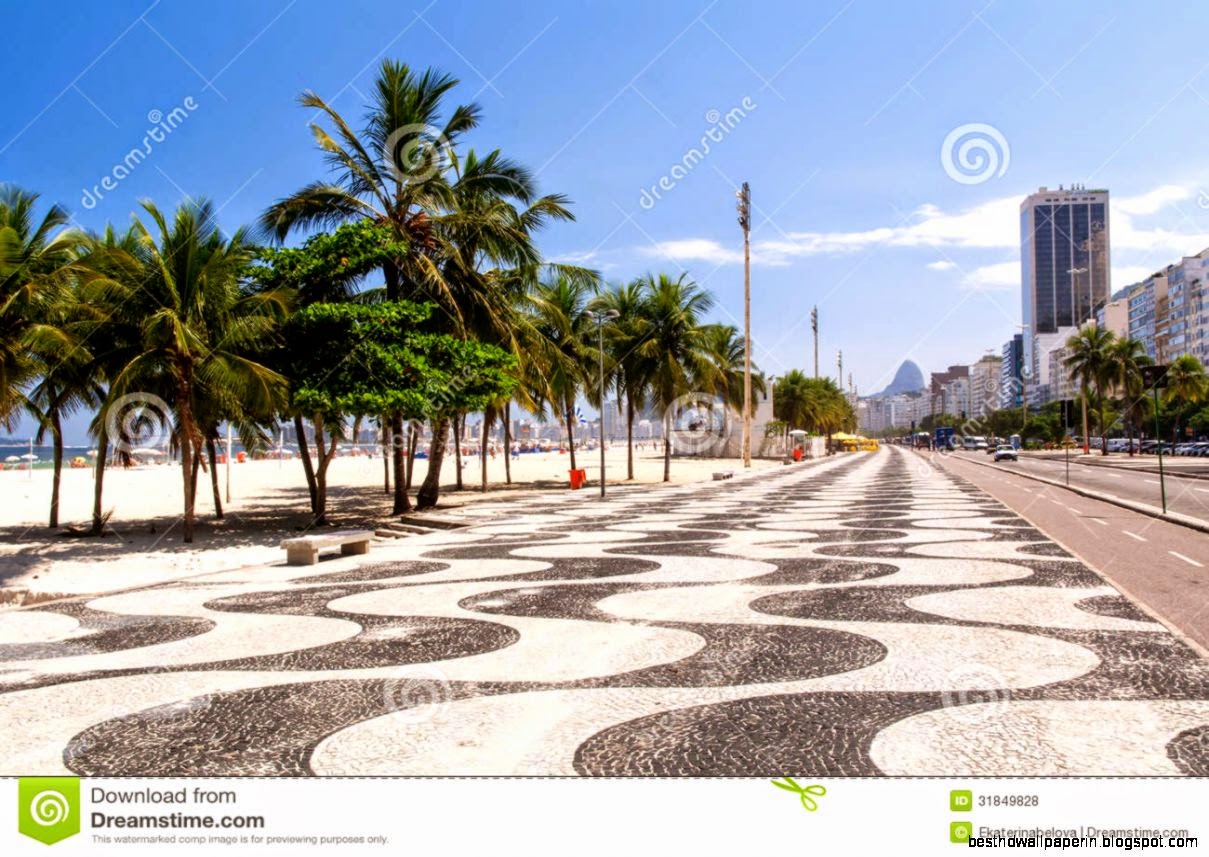 View Of Copacabana Beach With Palms And Mosaic Of Sidewalk In Rio View Of Copacabana Beach With Palms And Mosaic Of Sidewalk In Rio