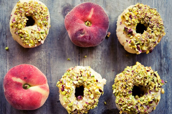 Peach Doughnuts with White Chocolate Glaze and Pistachios