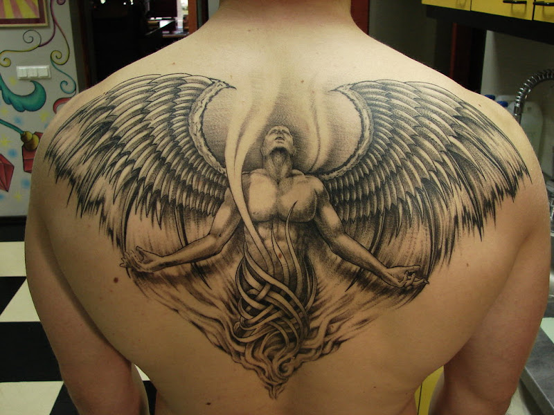 tattoo anjo de deus title=
