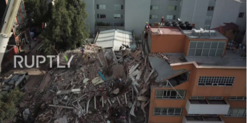 Drone captures rescuers searching rubble in Mexico City 