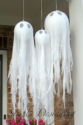 Want to know how to make hanging ghosts from Pottery Barn for a lot less than you can buy them for? Here's a Pottery Barn knock-off that makes the perfect not-so-spooky Halloween decor for your front porch!
