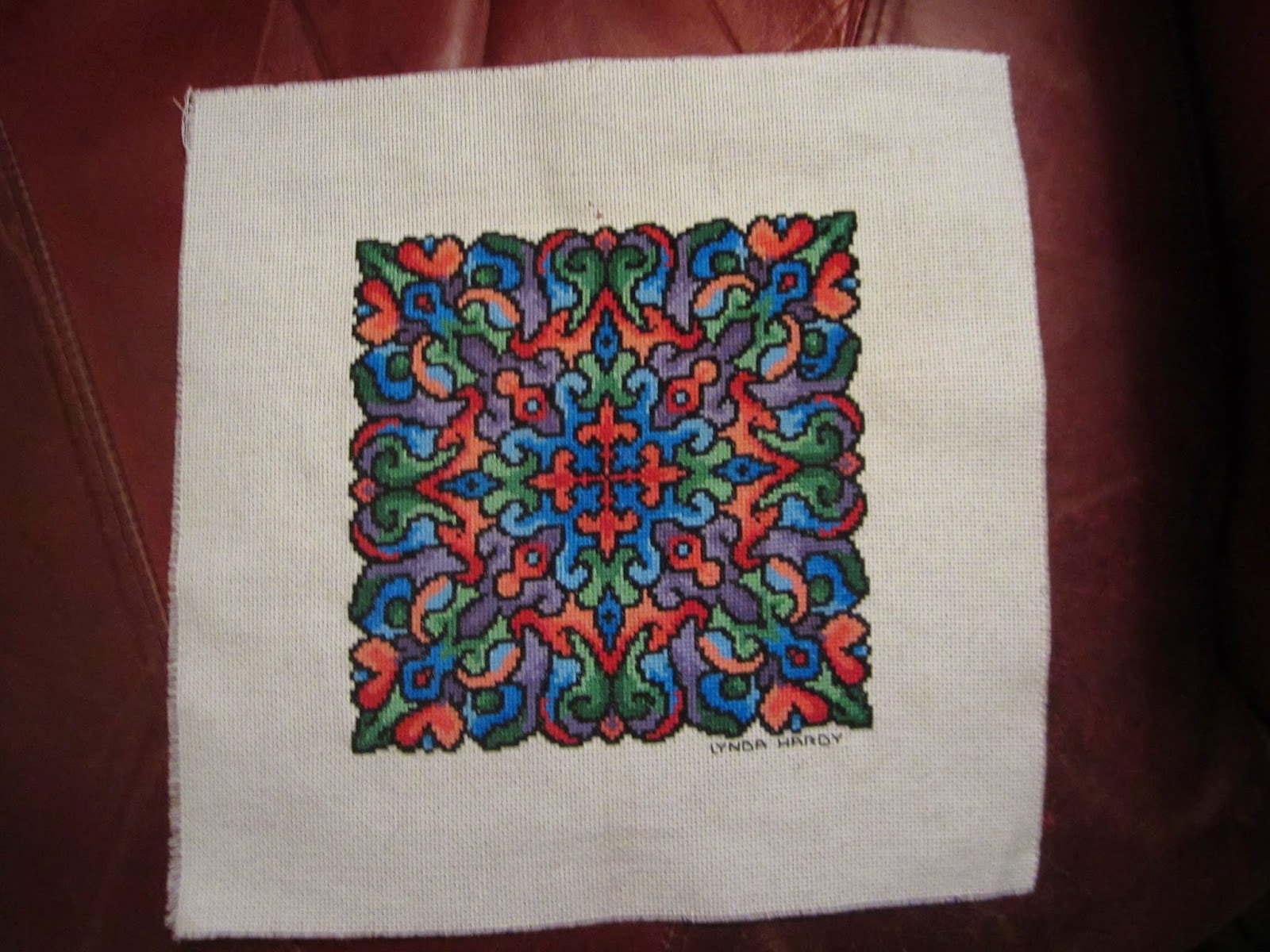 Reviews, Chews & HowTos Quickly Framing Stitchery