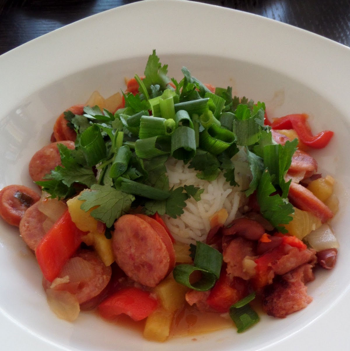 Sausage and Bean Sweet and Sour:  Pineapple sausage and beans in a spicy sweet and sour sauce served over rice.