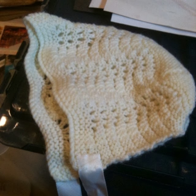 hand knitted baby bonnet