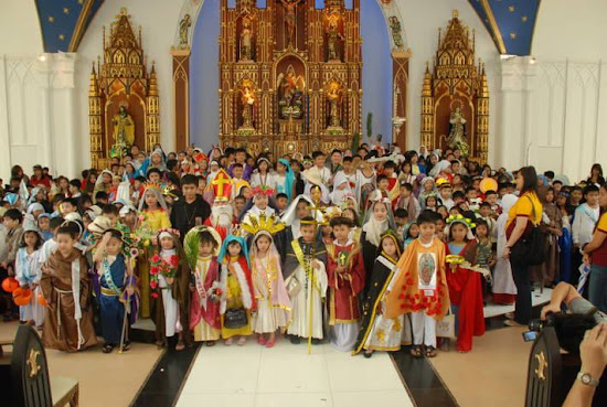 Children of Holy Angels University wearing saints' costumes.