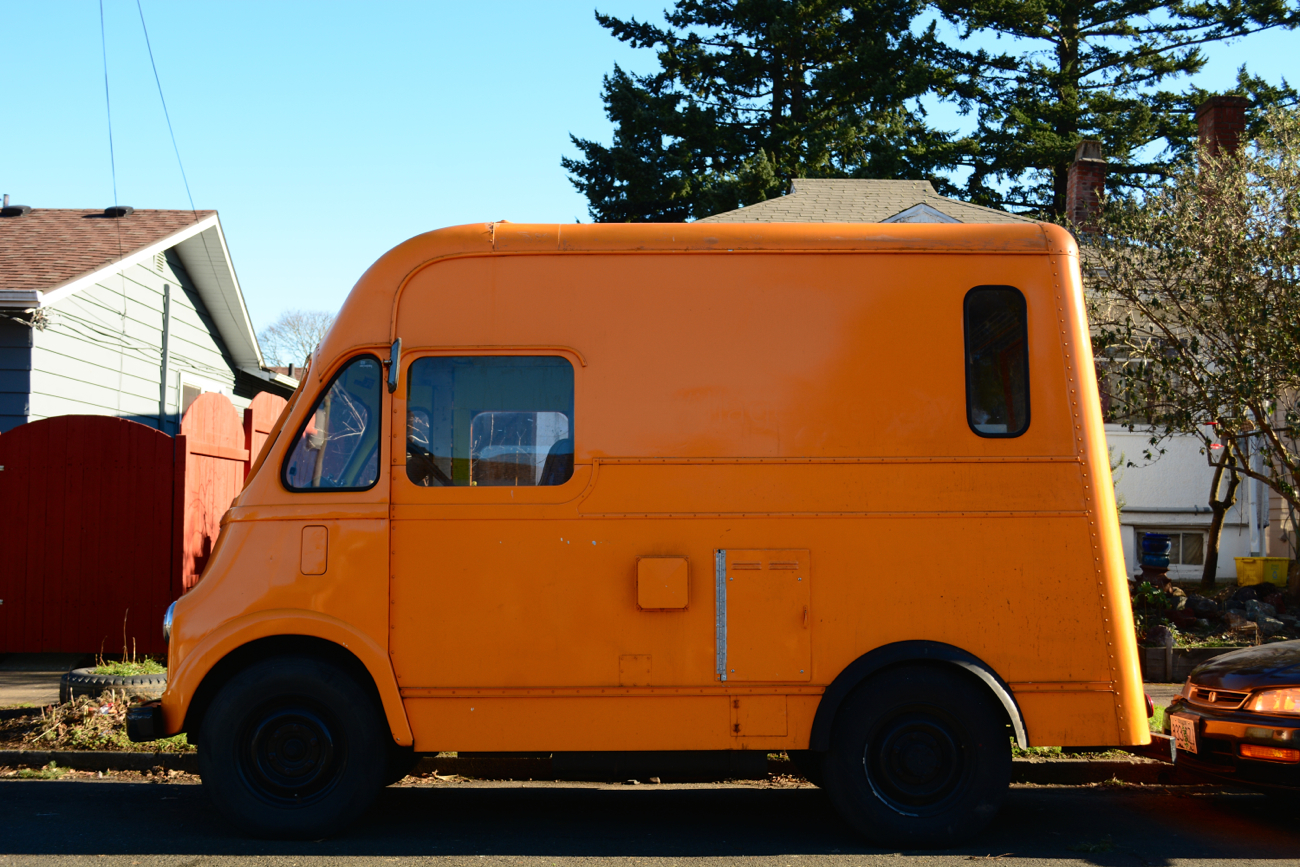 OLD PARKED CARS. 1958 International Harvester Shorty Metro Van.