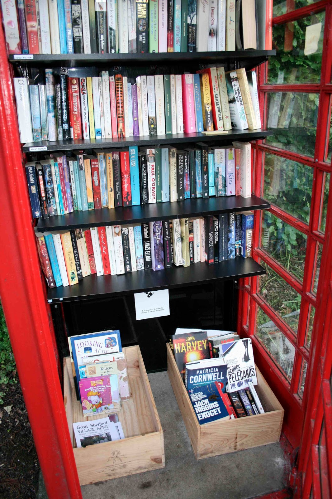 Literacy, families and learning Library in a Telephone Box British