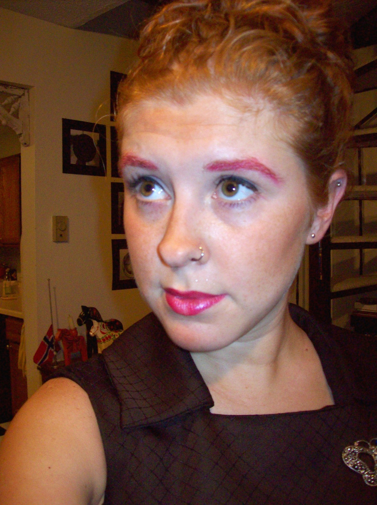Lipstick + qtip + eyebrow = awesome. In a very Cyndi Lauper way.
