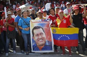 Los militantes del partido de Chávez prometen seguir la revolución del "padre"