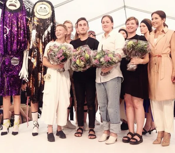 Princess Mary of Denmark visited the collection stand of fashion designing students