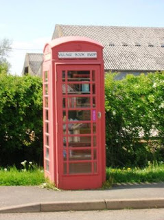 Old red telephone box geocache