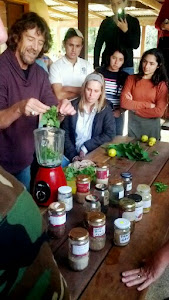 Geoff (the main teacher) making a tonic from various herbs from around the property