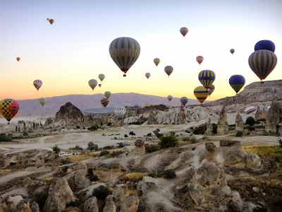 A parade of hot air balloons at Cappadocia Turkey