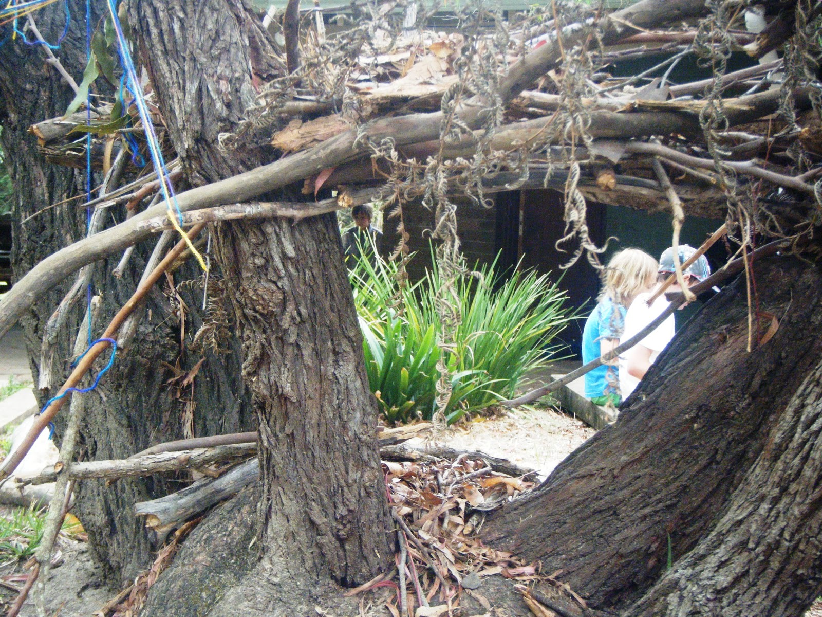 let the children play Building a house of sticks