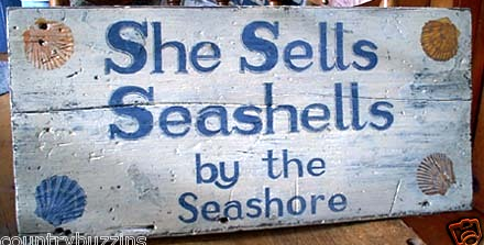 she sells seashells by the seashore wood sign