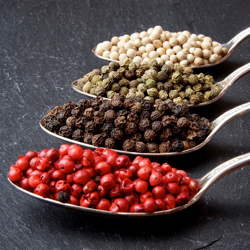 Behind the French Menu Poivre Peppercorns. White, Green, Black and Red Peppercorns. Grey