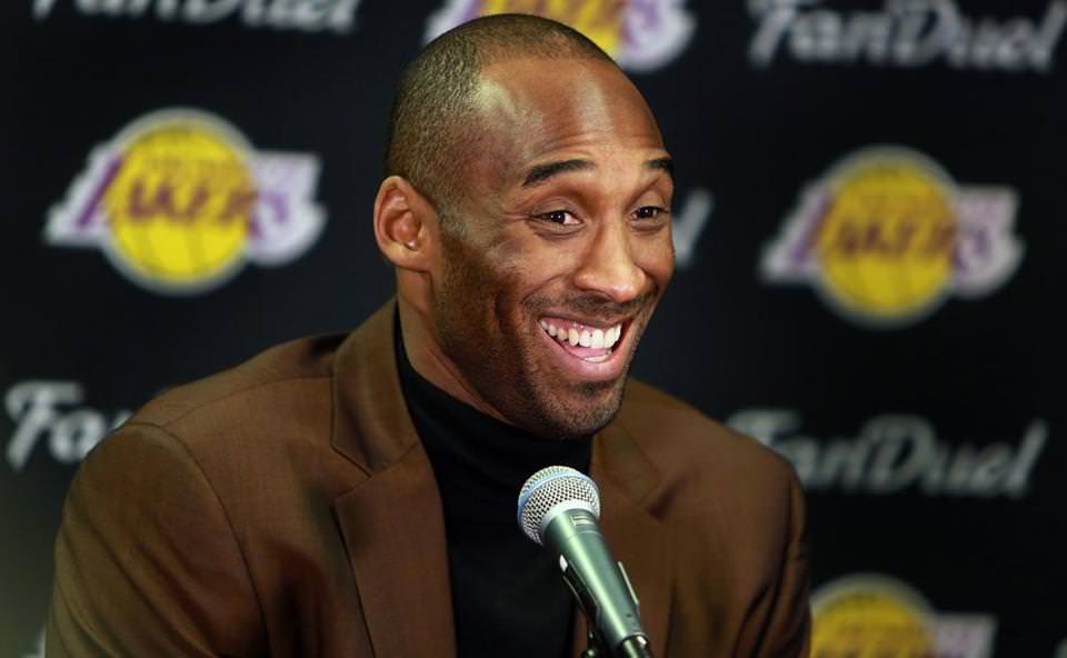 Lakers star Kobe Bryant was all smiles while meeting with the media before his final game in Boston.