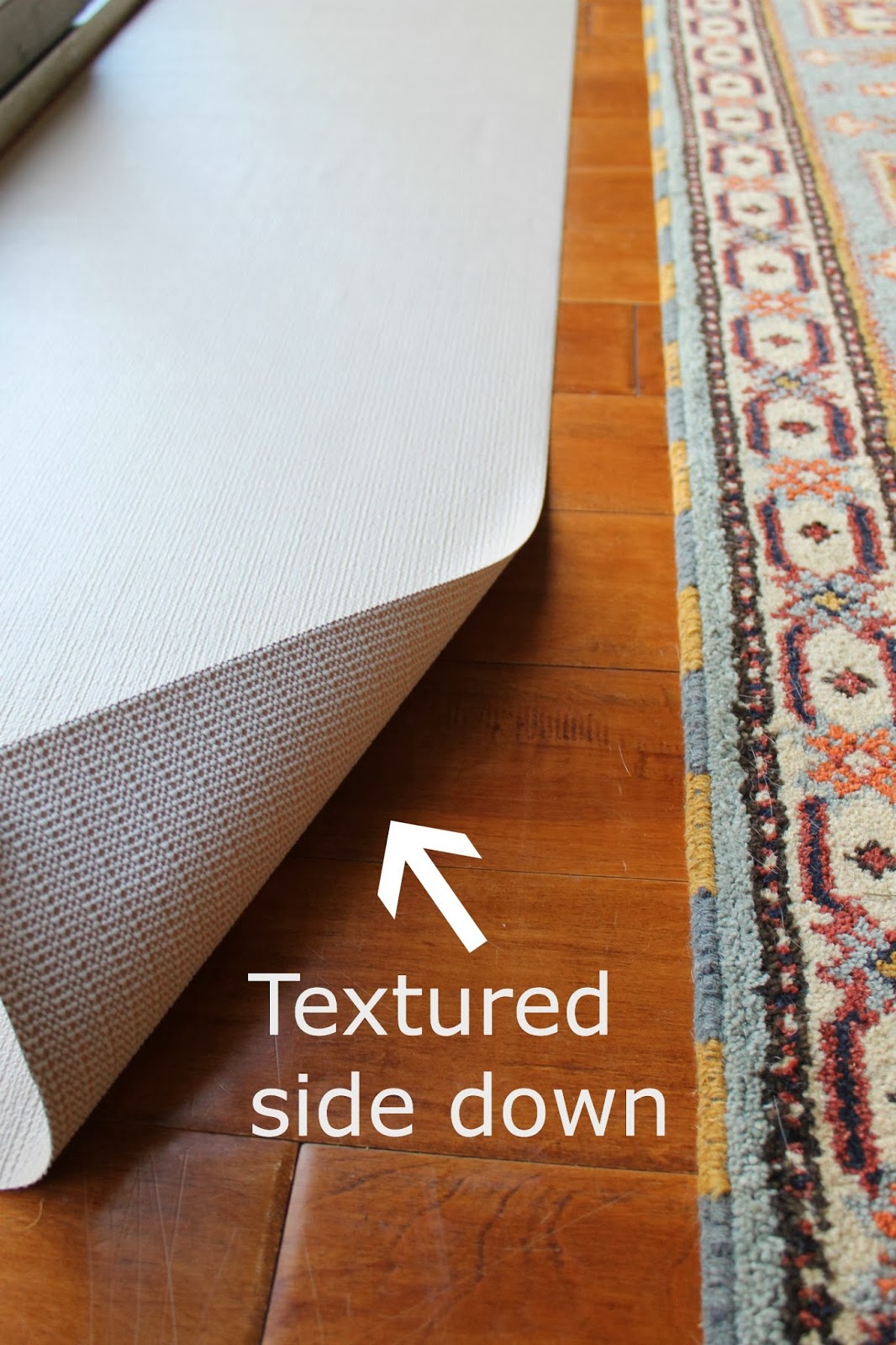 Make Them Wonder Check out what I used as a rug pad...