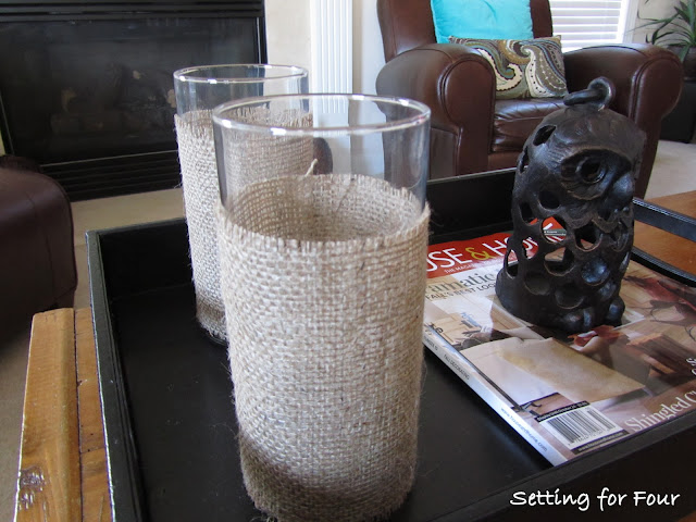 See this Quick and Easy way to dress up your hurricane candle holders with burlap! DIY Burlap Hurricane Sleeve with easy tutorial and supply list included.
