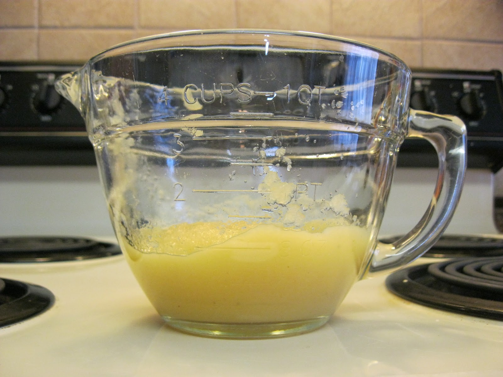 Using a heaping large scoop, fill the 18 cups with batter.