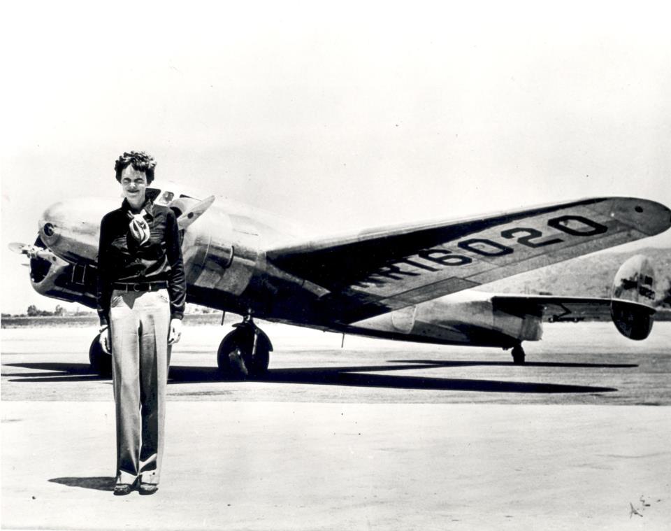 Amelia Earhart with airplane