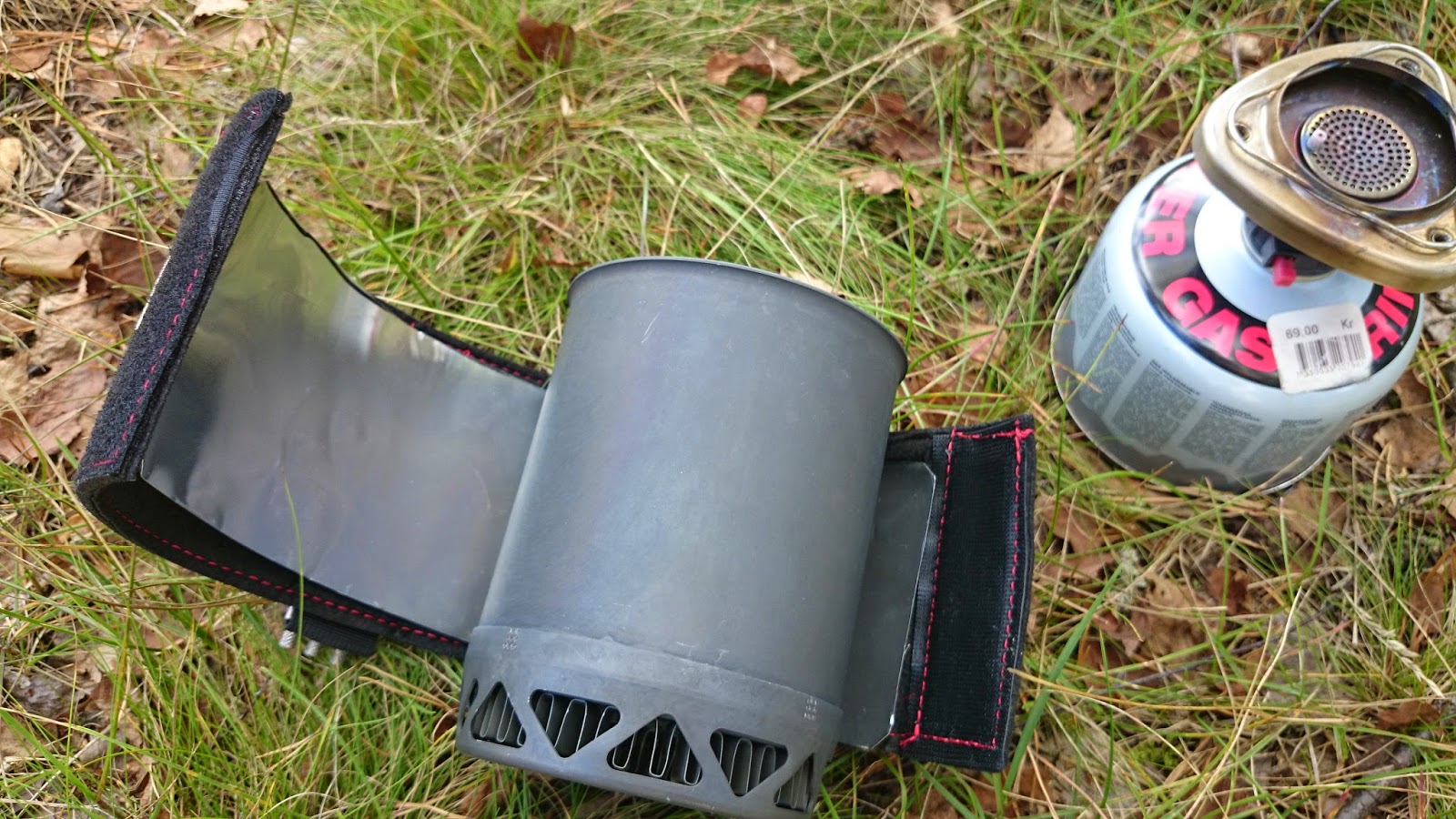 Brooks Range gear reflections on stove and footwear