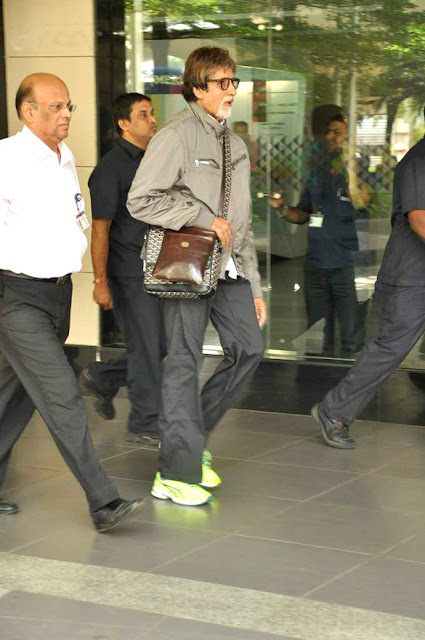 Amitabh Bachchan snapped in green florescent sports shoes 