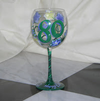 http://www.bybecca.com/birthday-glass-with-floral-design/ Yellow Green Lavender pattern hand painted wine glass