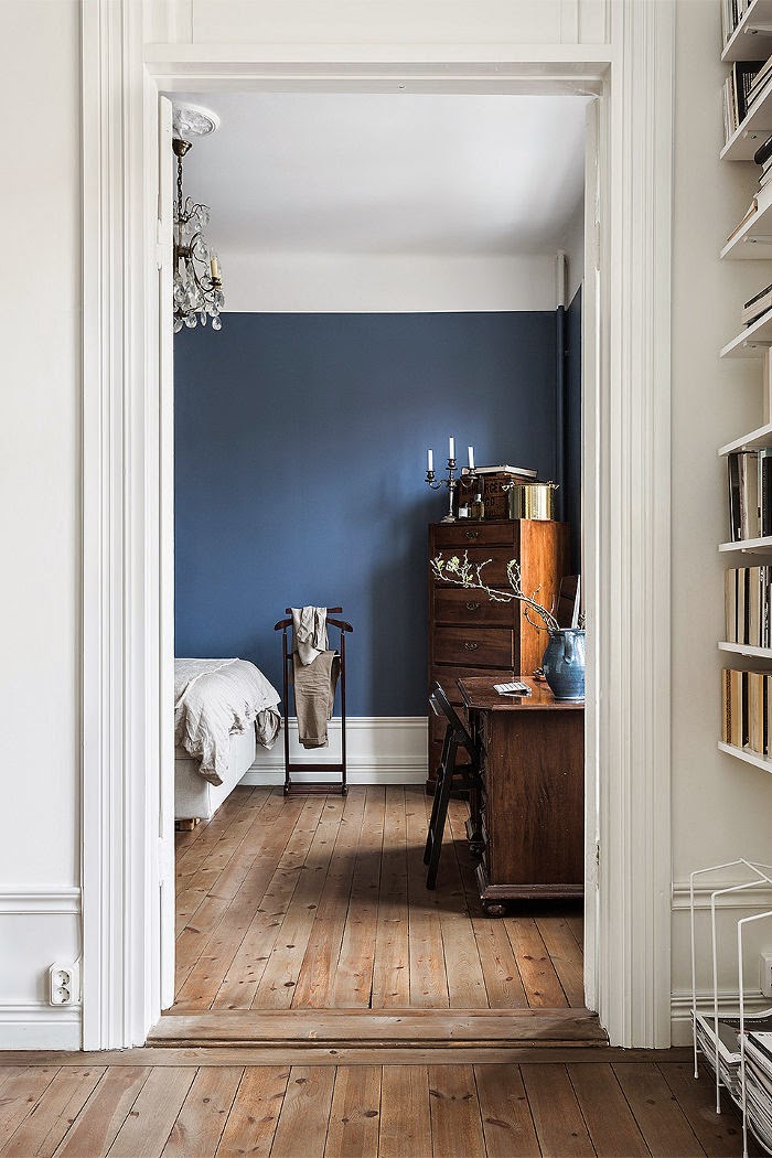 LAUsNOTEbook Apartment with a moody blue bedroom Stockholm