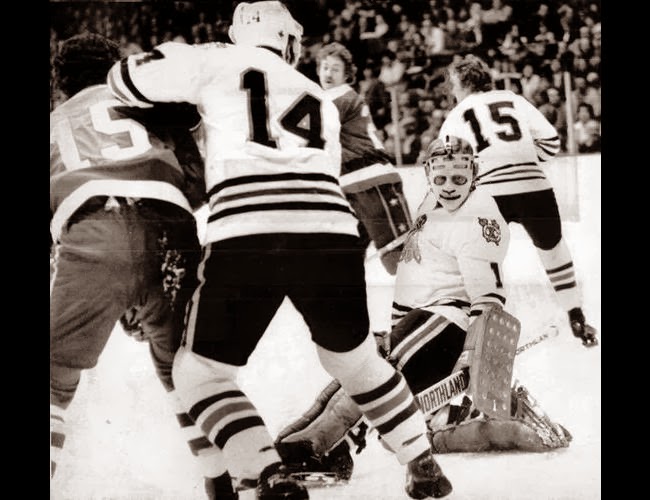 Guy Charron (15) and Tony White (background) both scored in a 4-4 tie (2/9/77) 