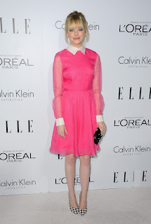 Emma Stone is one hot blond in a pink dress