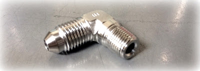 Custom machined mil spec elbow fitting dfar compliant - Engineered Source Inc is a supplier of custom & special dfar compliant machined fittings and fasteners - santa ana, orange county, southern california