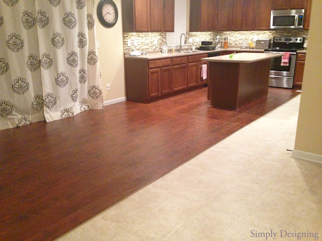 DIY Laminate Wood Flooring | #homeimprovement #flooring #diy | Simply Designing