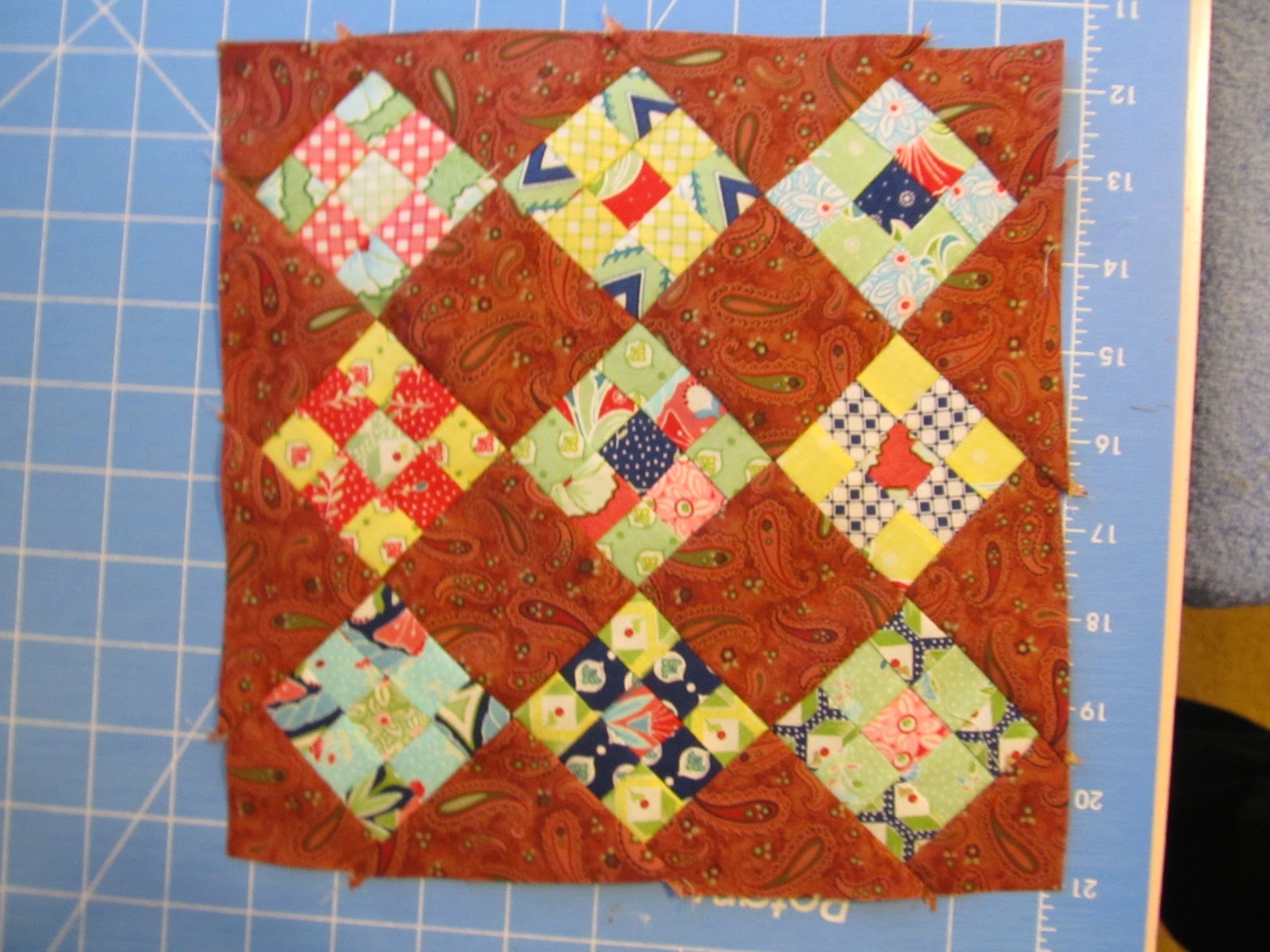 nine-patch quilt block into a quilted topper.
