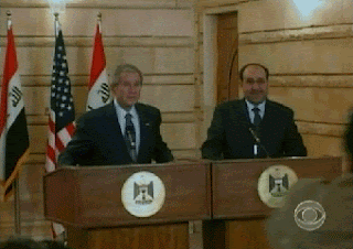 man-throwing-shoe-at-george-bush.gif