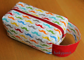 neceser "boxy pouch" con divertida y colorida tela de mostachos 100% hadmade por funkypatch