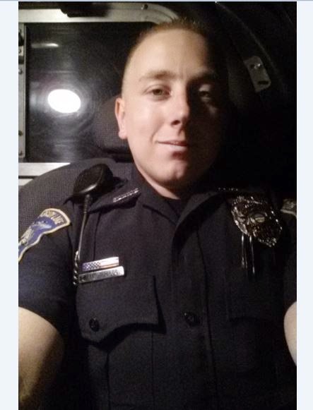 BLV cop Tyler McClamroch is so proud of himself he takes his own picture in a BLV cop car.