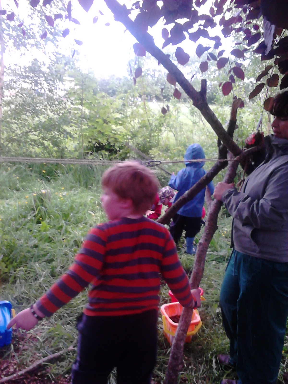 Tinderbox Forest School A rope, a bucket, and a couple of pulleys= Fun